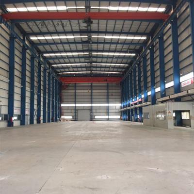 China Custom Prefab Commercial Construction Steel Structure Metal Fabricated Buildings for sale