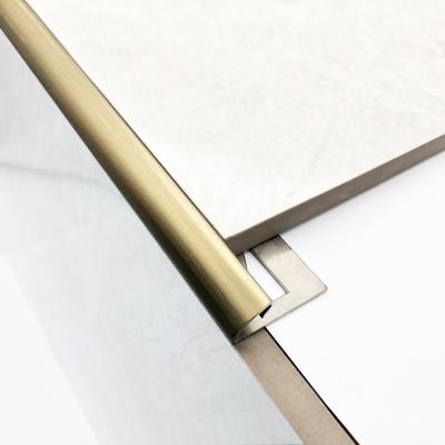 China Modern Foshan Manufacture 304 Ceramic Tile Trim Stainless Steel Tile Trims Edge Protection Profile With Holes for sale