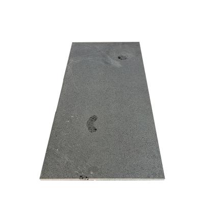 中国 Modern Sandblasted Honeycomb Basalt Stone With Exterior Bee Holes Tiles 販売のため