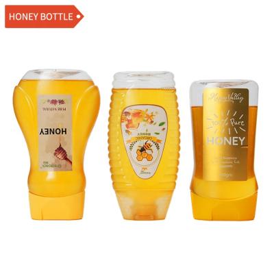 China PET gracepack PET inverted silicone valve honey squeeze bottle plastic, 500ml plastic bottle, honey bottle for sale