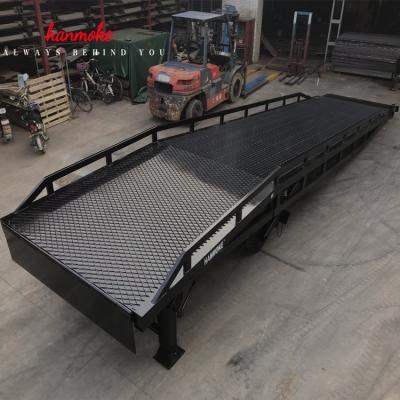 China Hotels 12 Ton Hydraulic Truck Unloading Ramps And Loading Ramp With Movable Yard Ramp for sale