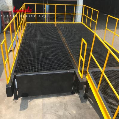 China Hotels 10 ton warehouse adjustable loading ramp with truck loading platform for sale for sale