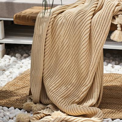 China 130*160cm Simply Acrylic Fleece Knitted Kids Sofa Bed Tassel Throw Blanket Custom for sale