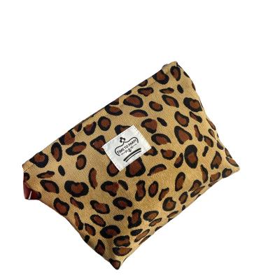 China Portable Hot Sale Custom Lleopard Print Cosmetic Pouch Portable Cosmetic Bag Travel Washing Makeup Case for sale