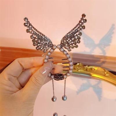 China Elegant Girl Hair Decoration Bun Hair Clip Shape Angel Wings Pearl Long Tassel Butterfly Grab Hair Clip for sale