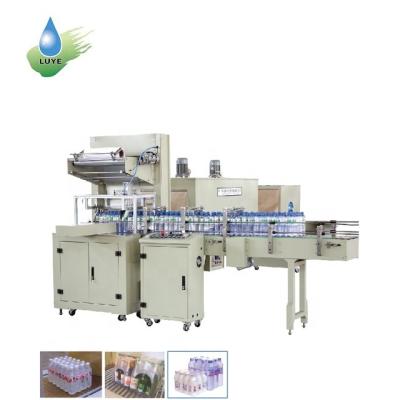 China 2022 Hot Sale Simple Operation Wrapping Film Wrapping Machine Heat Tunnel Shrink Wrap Wrapping Machine For Plastic Bottles for sale