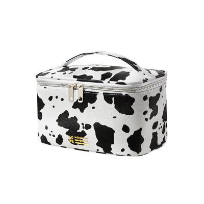 China New PU Cowhide Pattern Casual Cosmetic Portable Waterproof Travel Storage Cosmetic Bag for sale