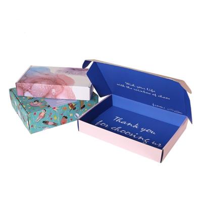 China Custom Attractive Cheap Price Portable Corrugated Pink Clothing Advertisement Packaging Box Recyclable for sale