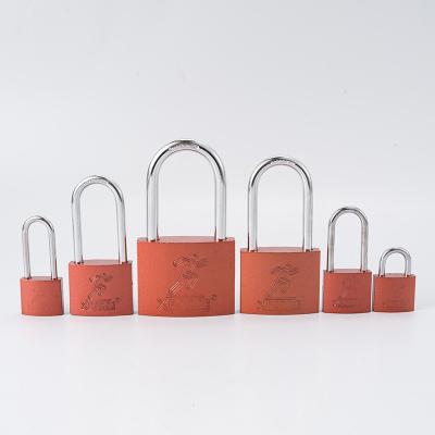 China Durable High Security Backing Sample Customized Eco-friendly Red Copper Cross Lock Direct Sales Candado Beam Iron Short Padlock for sale