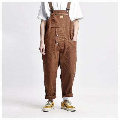 China Fashion Mens Overalls QUICK DRY Bib Pants 2021 Solid Joggers Pockets Loose Streetwear Cotton Straps Suspender Men Overalls Rompers for sale