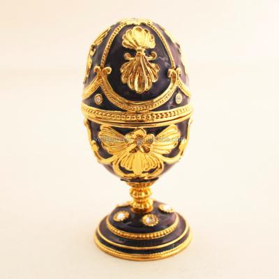 China 100% Handmade Christmas Egg Box Music Gift Metal Jewelry Box Standing Ring Boxes for sale