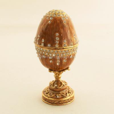 China 100% Handmade Metal Music Box Jewelry Box Standing Egg Box Ring Boxes for sale