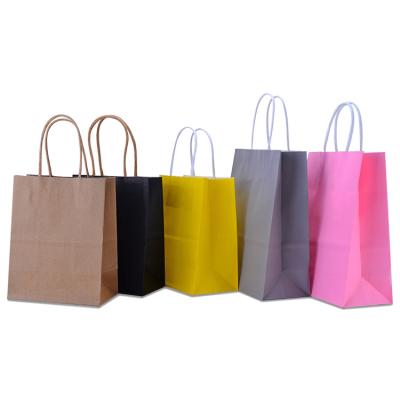 China Recyclable Custom Printed Logo Cardboard Kraft Gift Craft Shopping Paper Bag With Handles for sale