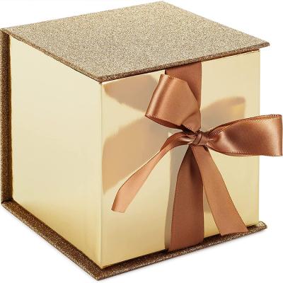 China Luxury Eco Friendly Materials Custom Beauty Gift Box Recycled Paper Folding Packaging With Decorative Ribbon for sale