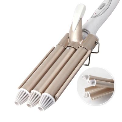 China Professional Safety Kemei-1010 Curling Irons Triple Barrel Hair Wave Crimper 110-240V Hair Care Styling Tools Curling Hair Curler Wave for sale