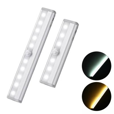 China Modern Hot Popular Battery Operated Stick On Anywhere Wardrobe Bed Lamp Led Motion Sensor Light For Sideboard for sale