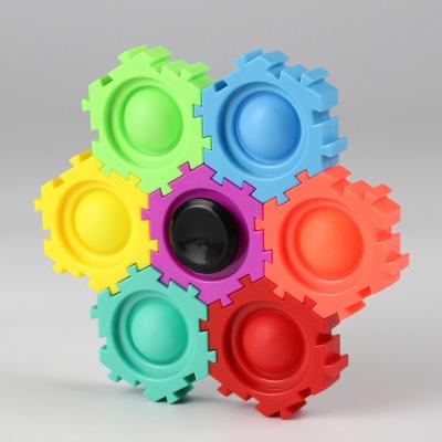 China Eco-friendly Simple Decompression Puzzle Building Block Anti Rotation Top Assembly Effort Bubble Children Education Gyro Busty Person Toys for sale