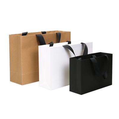 China Wholesale zy recyclable famous brand kraft gift bag custom shopping paper bags with logo for sale