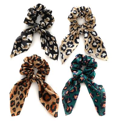 China Fashion satin leopard print scrunchies temperament spring and rabbit ears summer tied hair ring personality ribbon scrunchie for sale