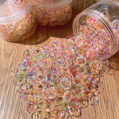 China Wholesale Disposable Transparent Color Of A Small High Tenacity Elastic Band Bowing Cute Hair Tie Girls Hair Tie for sale