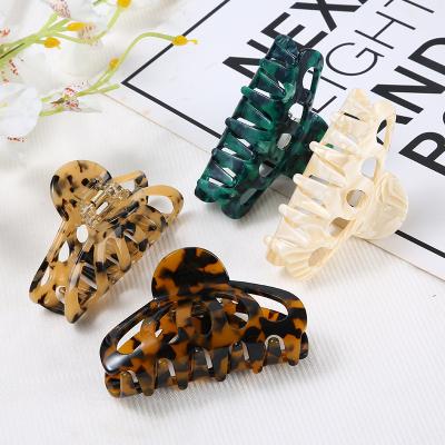 China Acetate Hollow Dish Claw Clip Fashion Smart Casual Head Ponytail Hair Claw Clip Back for sale