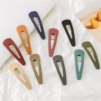 China Fashion solid color wholesale bangs clip temperament simple big drop-shaped snap cuts hollow snap hair clip for sale