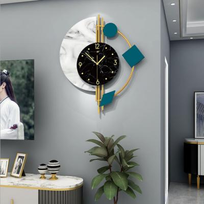 China New Arrivals Nordic Modern Silent Metal JJT Style Iron Wall Clock Manufacturers Great For Home Decorative for sale