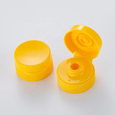 China Flip No 31-400 33mm Flip Top Screw Lid With X Cut Silicone Valve Multiple Color Customized For Honey Sauce Syrup Squeeze Cap Bottles for sale