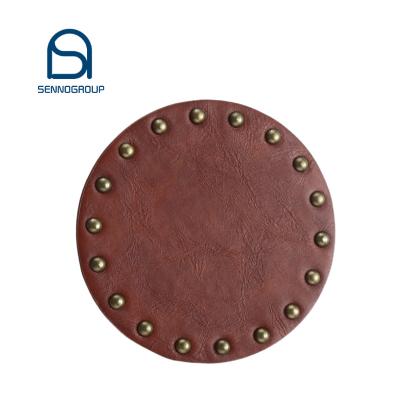 China Sustainable Luxury Unique Vintage Rivets Insulation Leather Round Table Mat Placemats Leather Coasters for sale