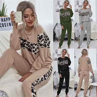 China Breathable Print Autumn Winter Women Suit Leopard Stitching Long Sleeve Round Neck Sweater Tracksuit Female Casual Set for sale