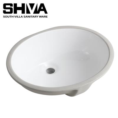 China Shampoo Sinks 20 Inch China Under Counter Oval Shape Ceramic Sinks Wash Basin With CUPC Certificate For Home Use for sale