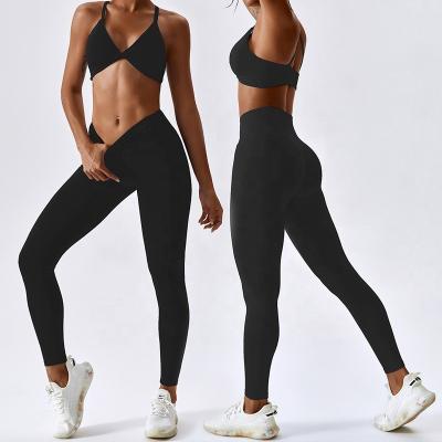 China Logo Naked Feeling Leggings Sets Custom Made Breathable Front Twist Sports Bra Workout Sets Women Gym Clothing for sale