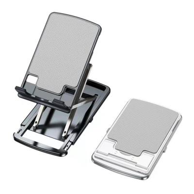 China Customized Multifunctional Adjustable Lightweight Double Fold Mobile Phone Aluminum Bracket, Flat Mobile Phone Bracket for sale