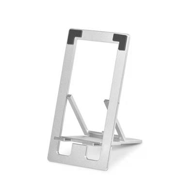 China Manufacturers Adjustable In China Aluminum Double Folding Portable Adjustable Lazy Thin Computer Mobile Phone Stand for sale