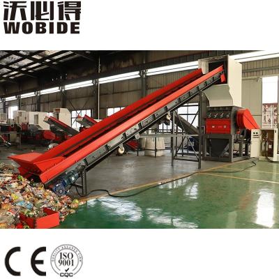 China Plastic Recycling PET Plastic Bottle With Low Speed ​​Plastic Conveyor And Fan Crusher for sale