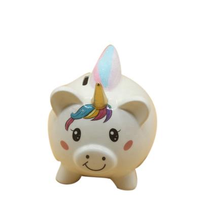 China Cartoon Unicorn Ceramic Coin Bank With Home Pig Shaped Piggy Bank For Kids Birthday Gift for sale