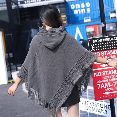 China 2018 Acrylics New Solid Color Hooded Hollow Tassel Hide Oversized Acrylic Cashmere Shawl Ponchos For Women for sale