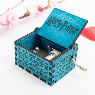 China High Quality Anime Cartoon Music Box Vintage Wooden Engraved Inspirational Quotes Crank For Birthday Musical Box for sale