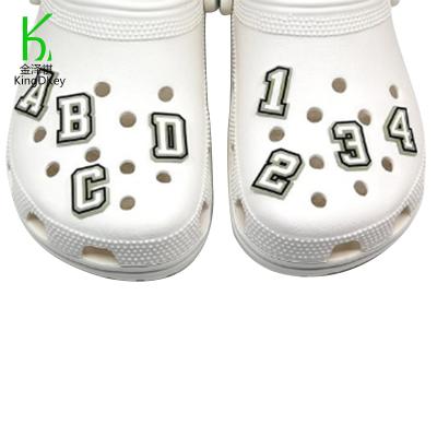 China Rubber Croc Shoe Charms Clogs Accessories Buckles PVC Gl0w in Dark Letter Holes Decorations Shoe for sale