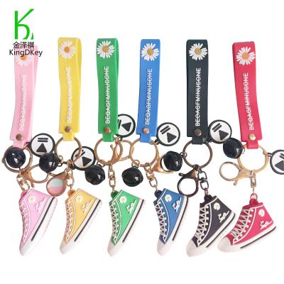 China Small Mini Cute Daisies Keyring Rubber Fashion 3D Canvas Shoes Key Chain With Bell Bag Pendant Ornaments for sale