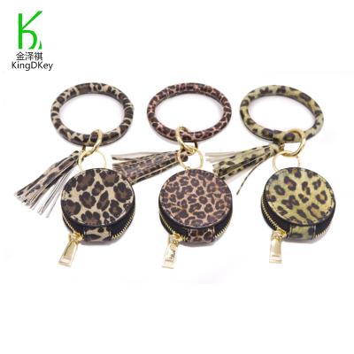 China Newest Portable Cosmetic Bag Leather Leopard Printed Makeup Leather Case Key Chain Clasp Mirror Charm Bracelet Leather Keychain for sale