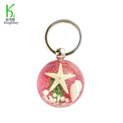 China Manufacturer Beautiful Decoration Resin Ball Shaped Sea Animals Theme Starfish Seashell Head Chain Pendant for sale