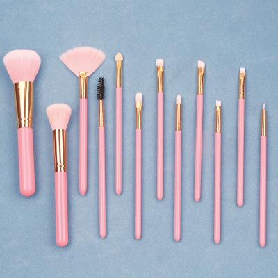 China Angular Blush Pink Makeup Brushes 12pcs/set Makeup Brushes Private Label Vegan Makeup Brush Pink for sale