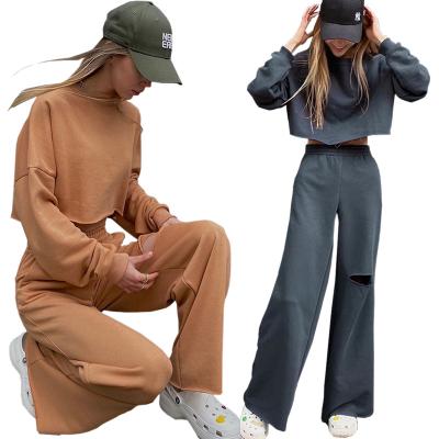 China New Arrival Women's Anti-Pilling Custom Logo Loose Cropped Sweatshirt And Ripped Wide Leg Pants Set For Women for sale