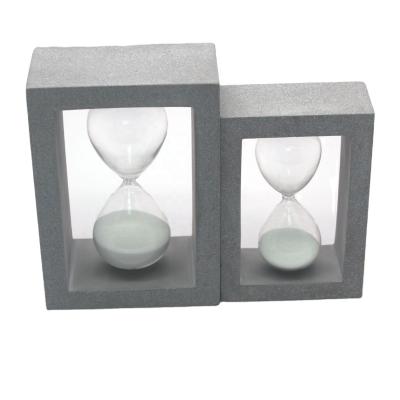 China Factory Price Modern Glass Sand Hourglass Timer With Frame Cement For Home Decor And Gifts Wholesale for sale