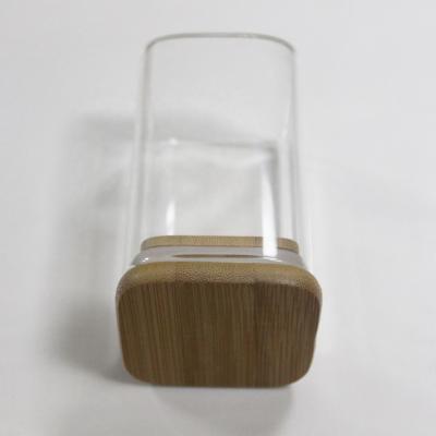 China Stock High Quality Square Borosilicate Glass Jar With Bamboo Kitchen Storage Lid Glass Jar for sale