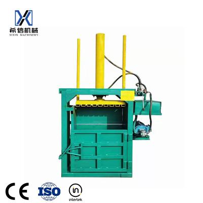 China Food Waste Paper Packing Machine / Hydraulic Cardboard Compress Baler Packing Machine for sale