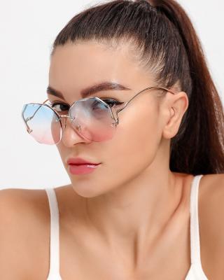 China Fashion Sunglasses Shape Round Sunglasses Women Trendy Designer Sun Glasses Custom Cut Edge Rimless Sunglasses for sale