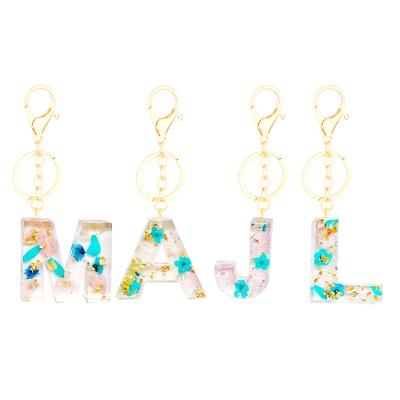 China Custom Jewelry Eternal Crystal Pendant Flower Epoxy Resin Flower Letter Dried Flower Key Chain Dry Key Chain for sale