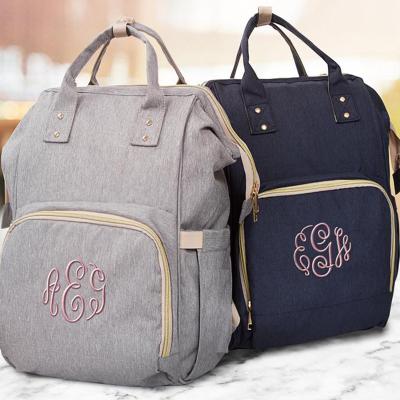 China Monogrammed High Fashion Embroidered Zipper Backpack Diaper Bag Eco-Friendly Diaper Backpack for sale